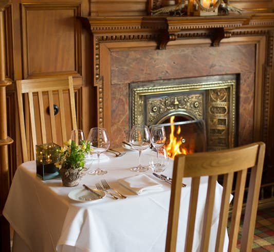 dining by fireplace